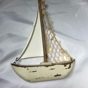 White vintage sail boat!
